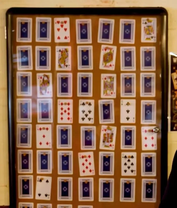 The Jackpot Joker board on the wall at Weston Bull, rows of playing cards face down